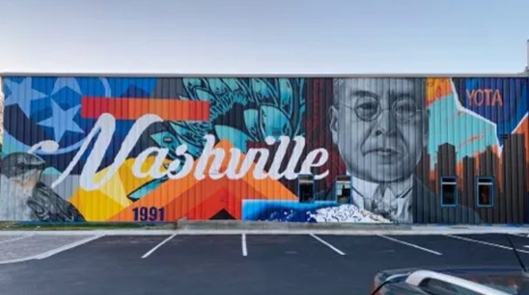 Colorful Nashville mural with bold lettering, perfect for a Nashville girls trip photo.